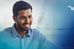 man smiling in casual shirt