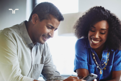 two people in a happy discussion