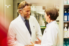 two doctors conversing with each other