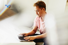 man working on a laptop