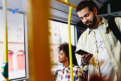 man and woman in bus