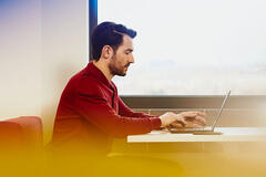 man working on a laptop