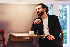 man sitting in a cafe