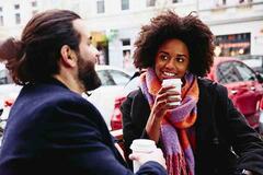 Woman talking to coworker