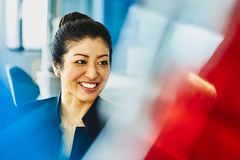 woman in a boardroom at work
