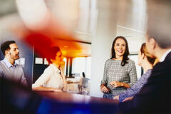 two colleagues talking in the office