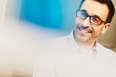 man smiling looking to the left