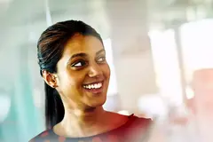 Close up - Smiling female looking away 
