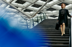 female walking down stairs