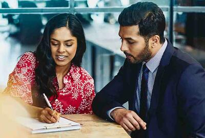 Two People working