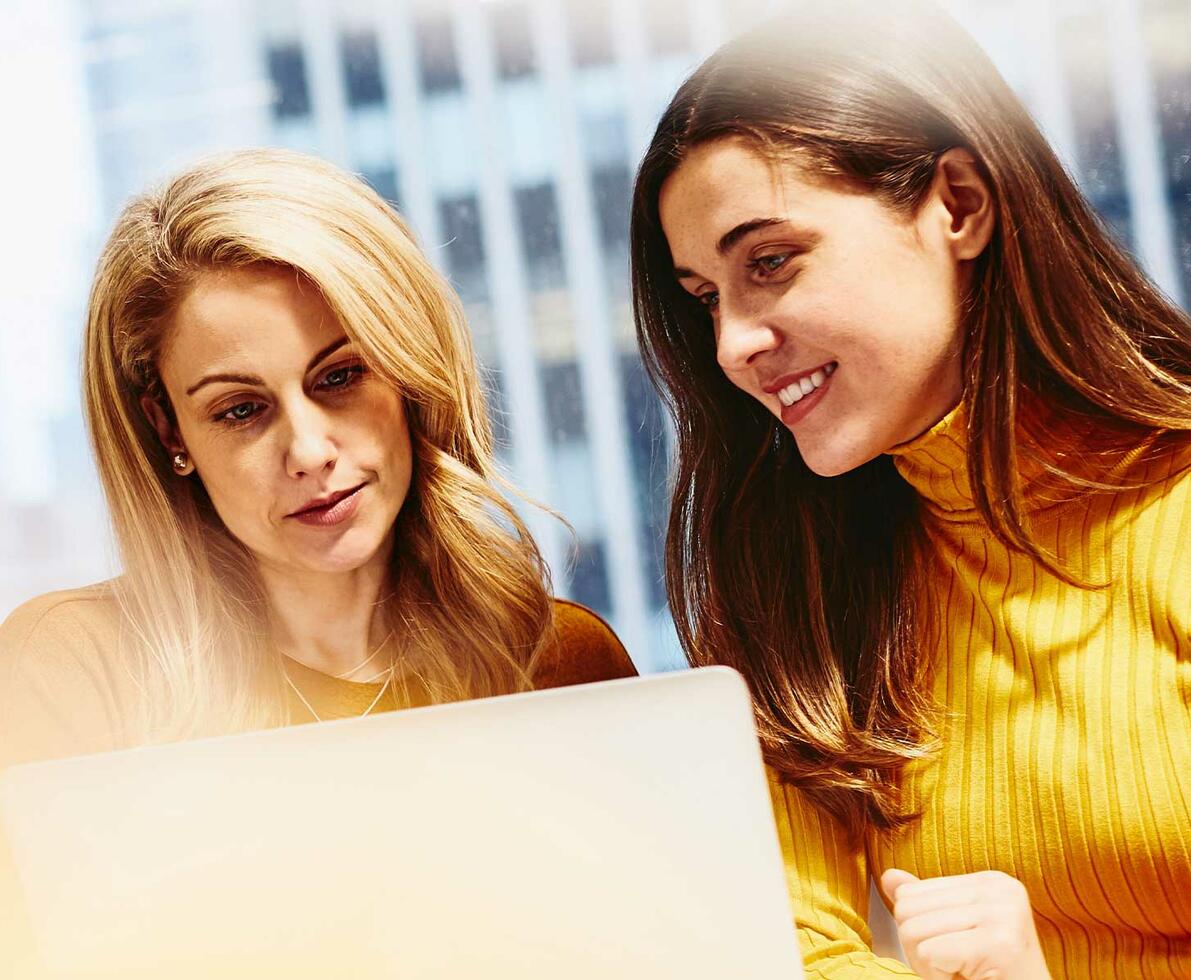 women working on computer