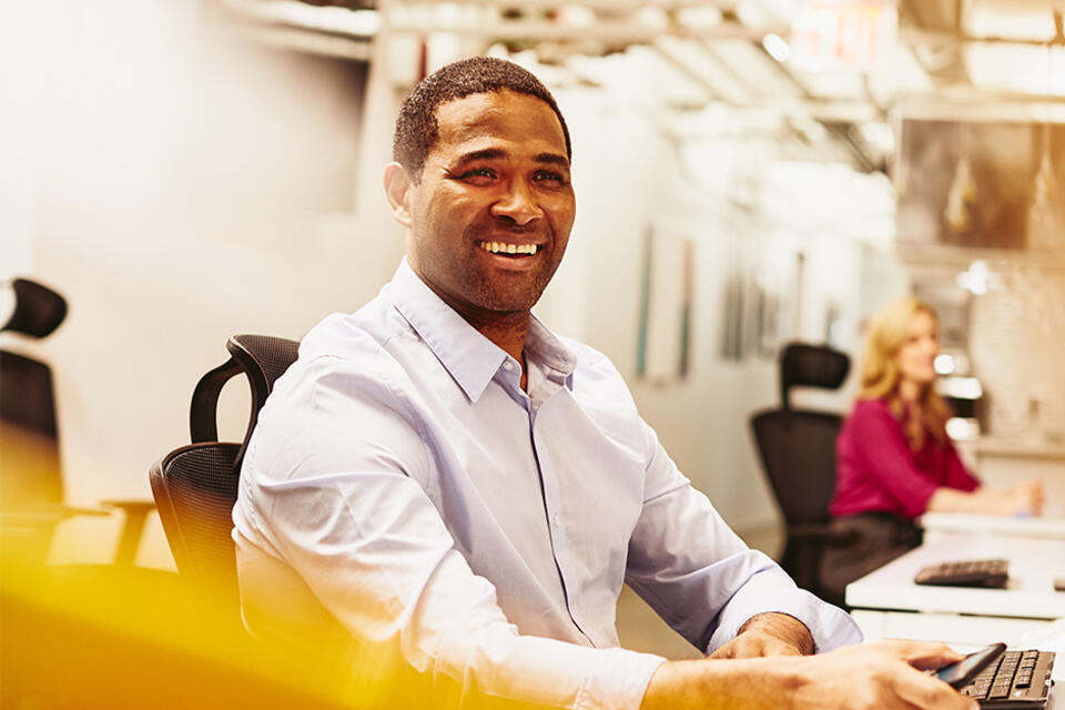 Smiling man working